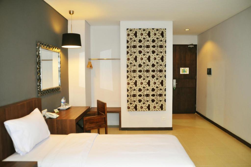 Praja Hotel Denpasar Zimmer foto
